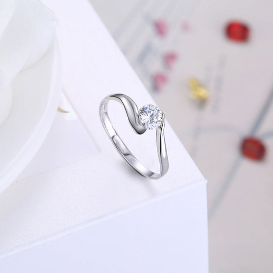 Aurore | Anello Solitario con Incastonatura a Spirale