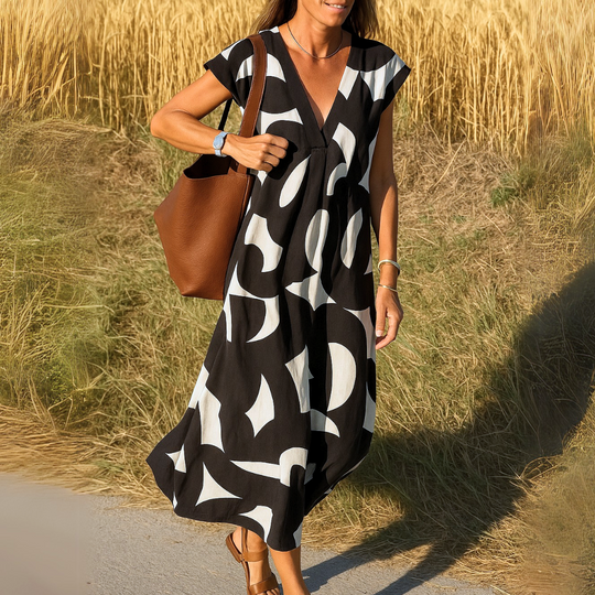 Tirzah | Flowy V-neck dress with geometric design
