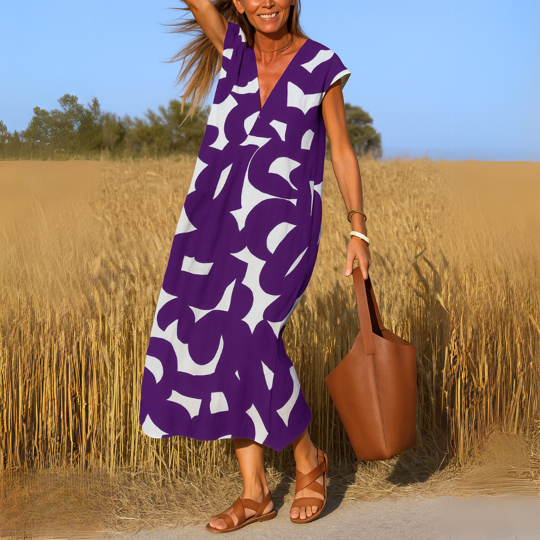 Tirzah | Flowy V-neck dress with geometric design
