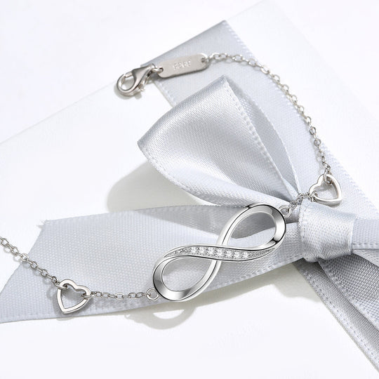 Eternale | Bracciale Infinito decorato con cristalli e cuori eleganti