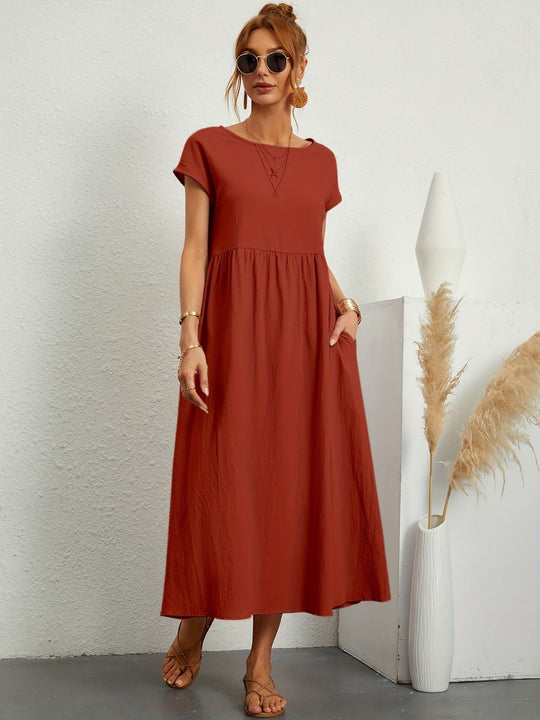 Clara | Abito midi fluido con tasche