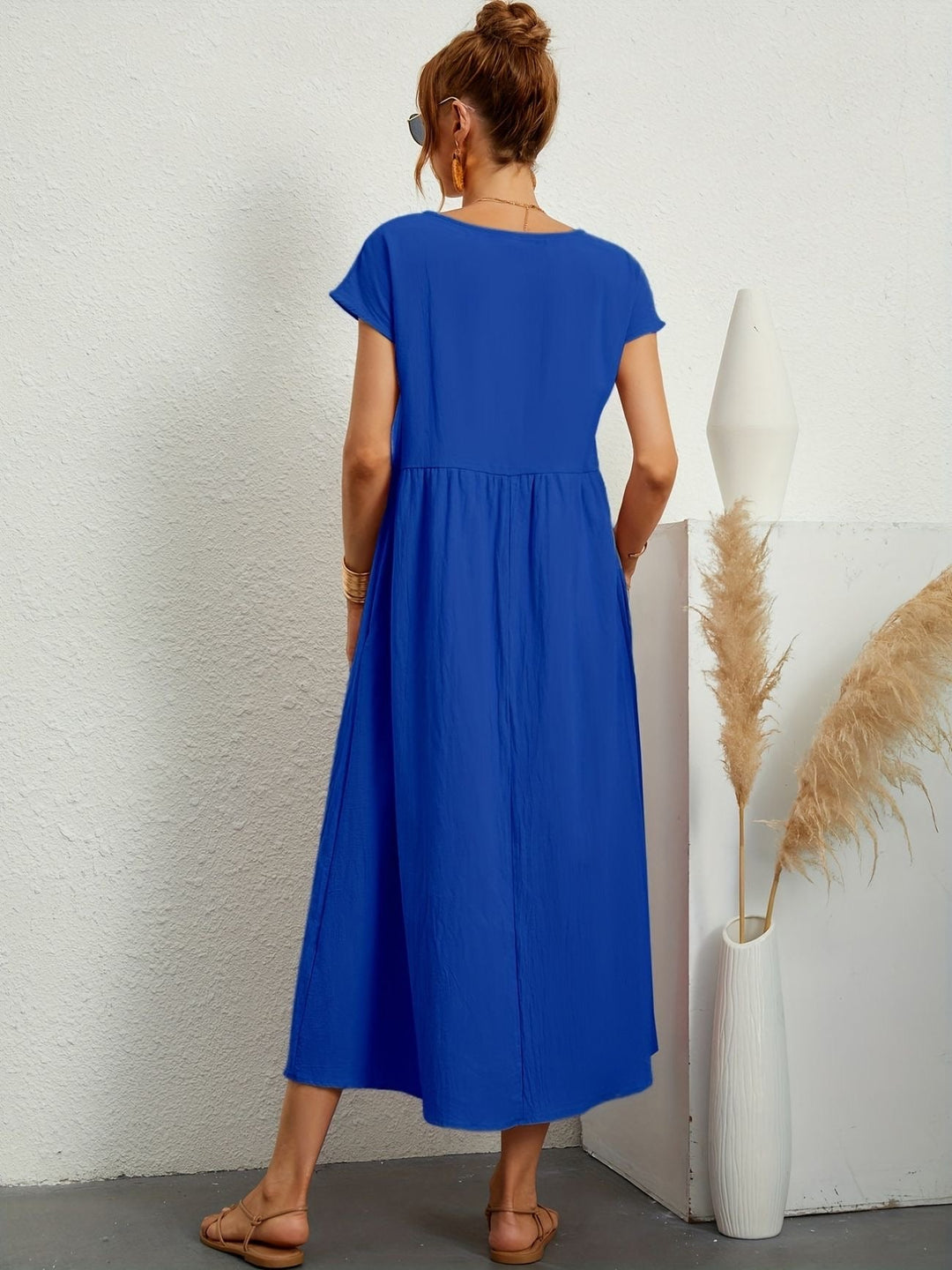 Clara | Abito midi fluido con tasche