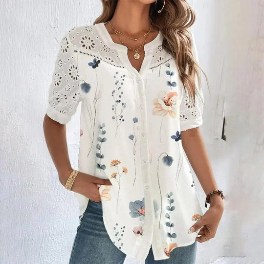 "Tanja - Blusa in pizzo con maniche corte" can be rewritten as "Tanja - Blusa in pizzo a maniche corte".